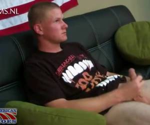 looking at the porn movie attracts the young man his stiff dick. solo , looking to the porn movie he pulls off