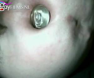 slowly pushes the horny boy, the can deeper into his anus again, and again quietly. extraeme , anal mastubate a tin can